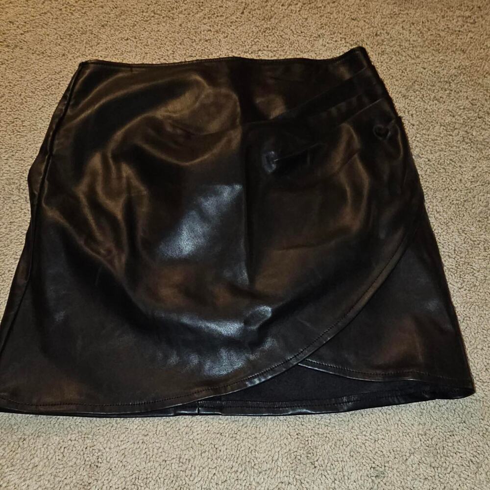 Black leather mini skirt